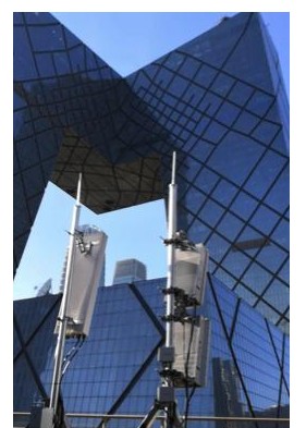 中国移动已经在中央商务区开通2.6GHz+4.9GHz 5G双频网试验点