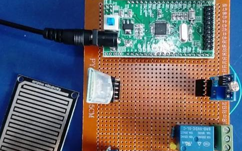 STM32+雨滴传感器电路+光照传感器电路+蓝牙...