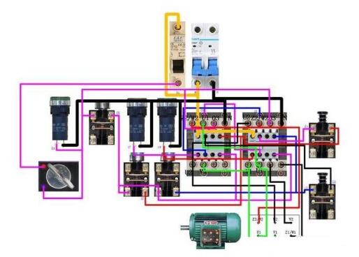 限位器控制单相电机正反转的实物连线图